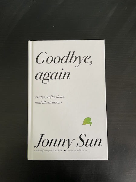 Jonny sun's goodbye again sitting on a sideboard table